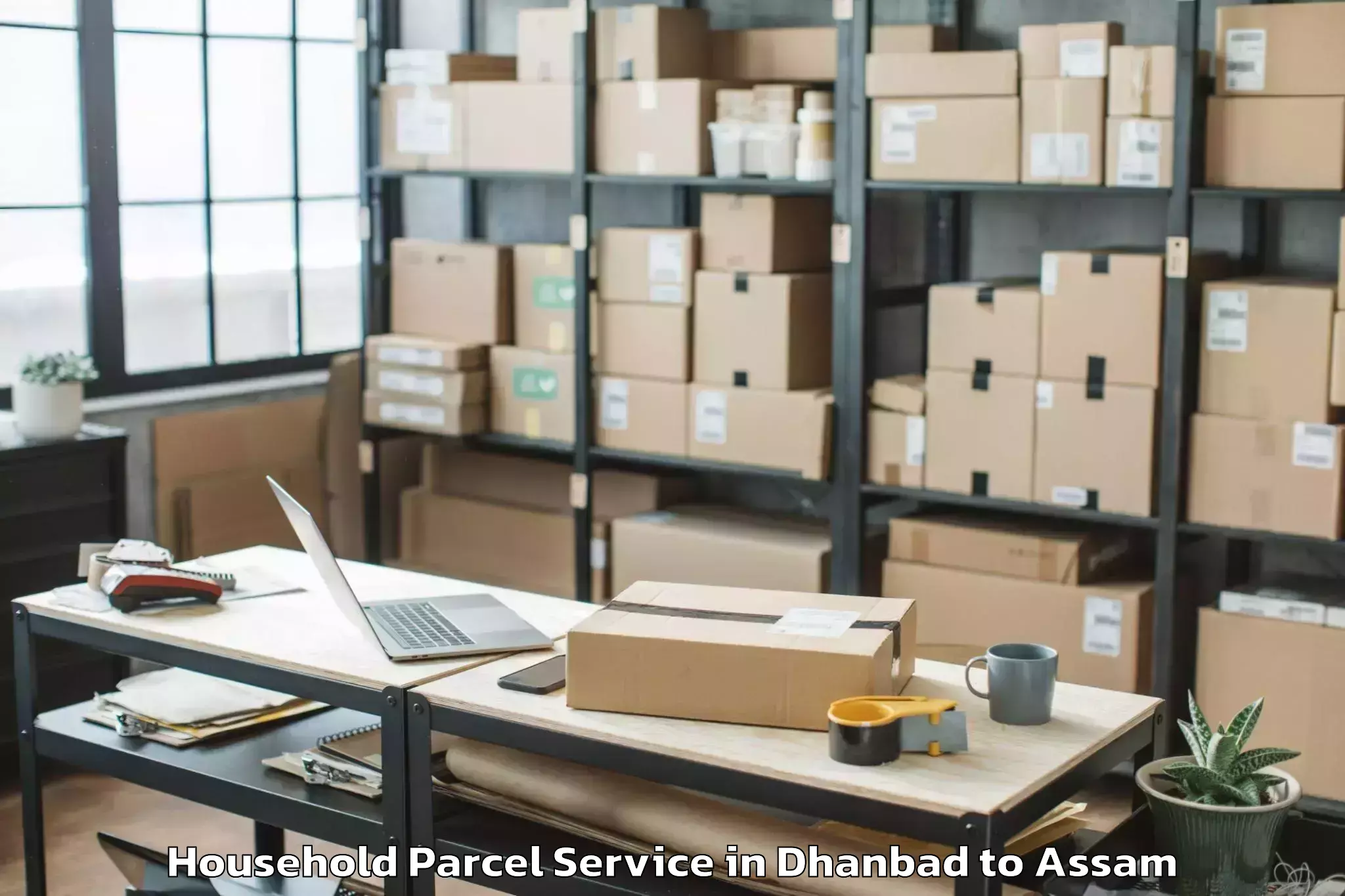 Professional Dhanbad to Rajakhat Banekuchi Household Parcel